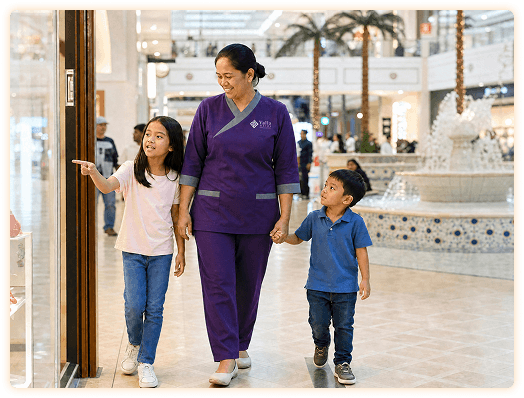 Live-in maid caring for a child at home in Abu Dhabi