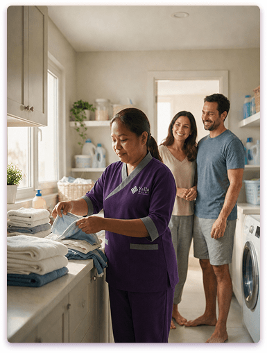 Live-in maid from Yalla Maids doing laundry in an Ajman home