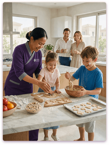 Live-in maid from Yalla Maids cooking with children in a Sharjah home