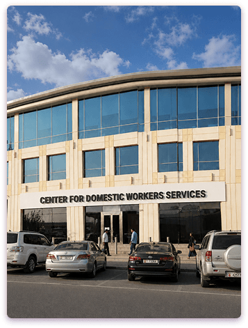 Vetted Yalla Maids domestic worker tidying a modern Ras Al Khaimah home